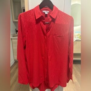 Red Athleta Collared shirt. Medium. Some stretch. Chest pocket. Hidden buttons